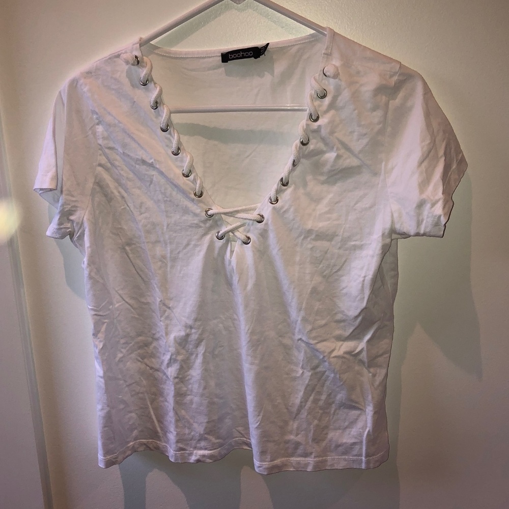 white v-neck with rope detail